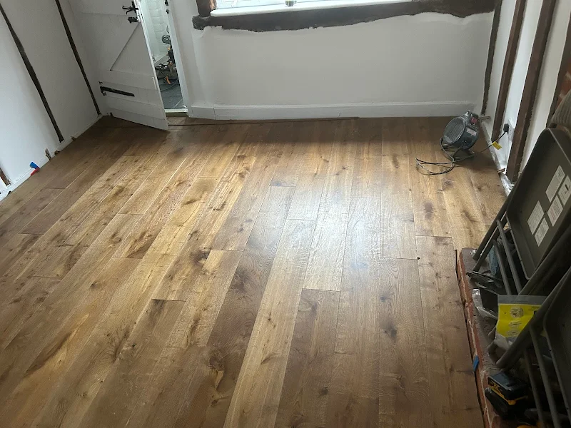 https://sandssurreydevelopment.co.uk/wp-content/uploads/2026/06/flooring-1.webp
