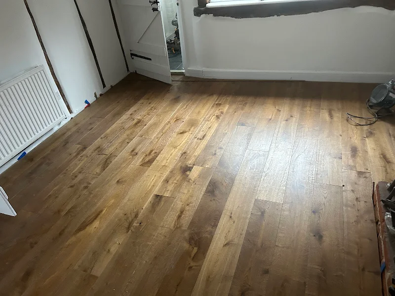 https://sandssurreydevelopment.co.uk/wp-content/uploads/2026/06/flooring-2.webp
